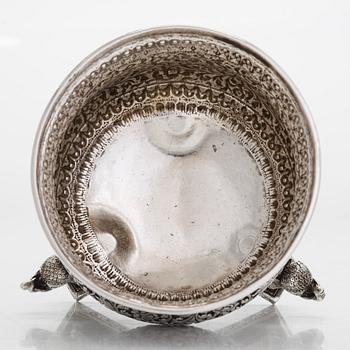 A 19th-century lidded tripod silver bowl, India.