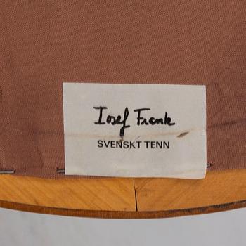 A ottoman model 647 from Svenskt Tenn.