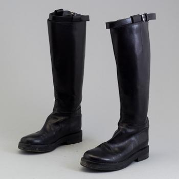 a pair of Ann Demeulemeester, "Vitello Lucido Nero Riding Boots". Size 38.