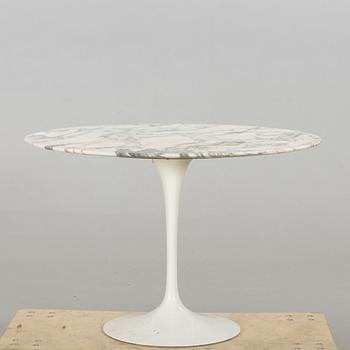 A marble top table later part of the 20th century.