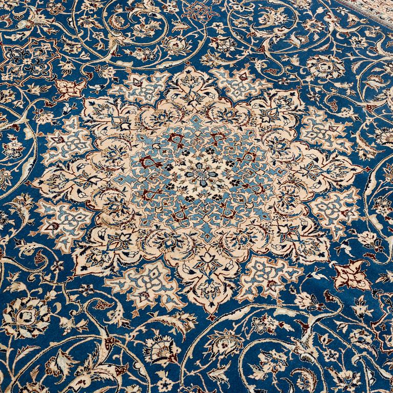 A semi-antique Nain Tusheshk, signed, ca 324 x 223 cm.