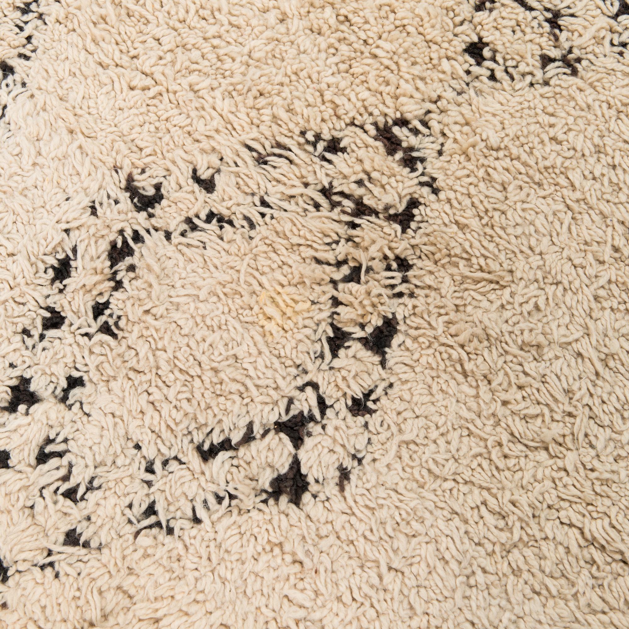A Moroccan Beni Ourain carpet. circa 420x196 cm.