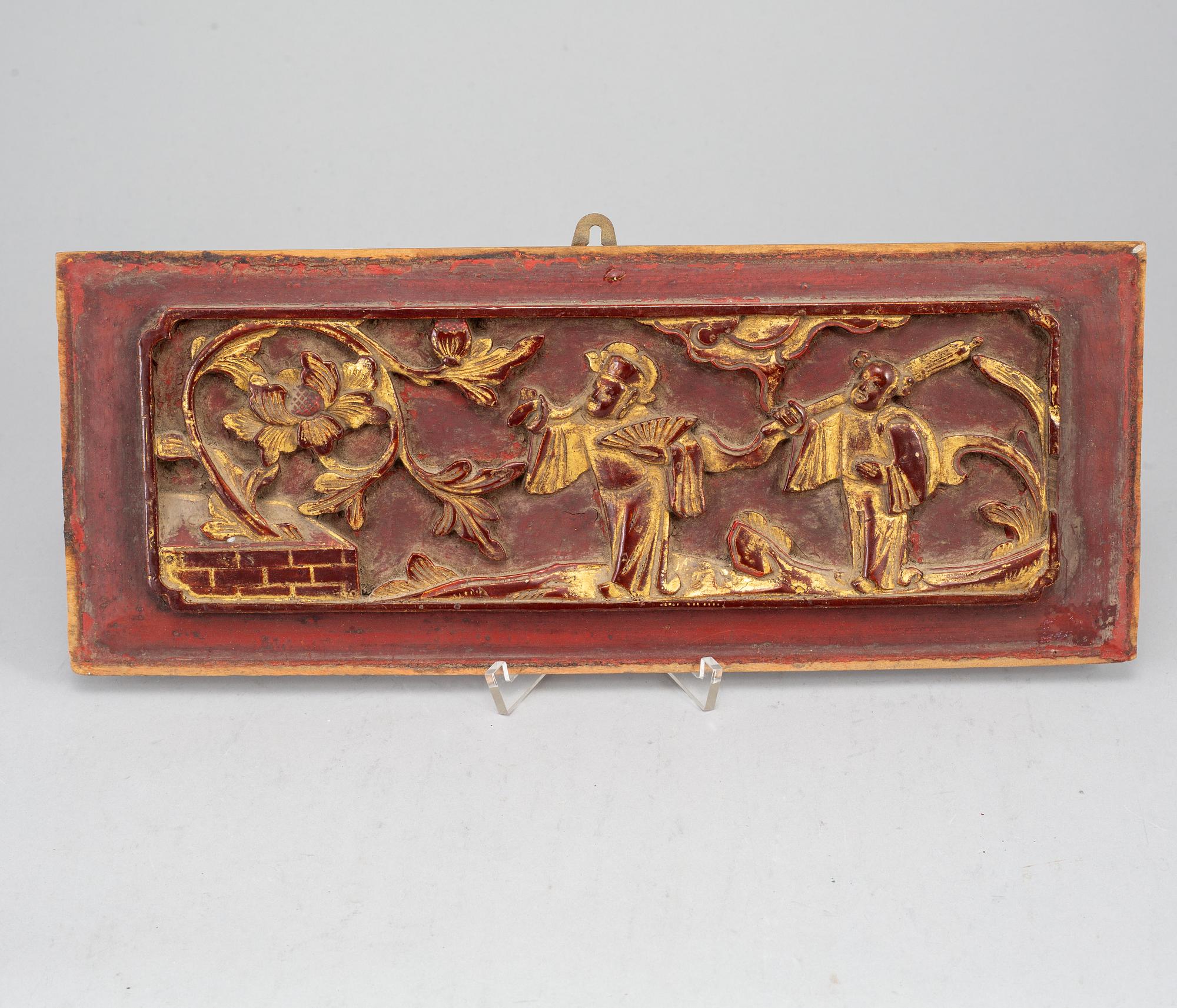 A wooden tray and two panels, Qing dynasty, 19th Century.