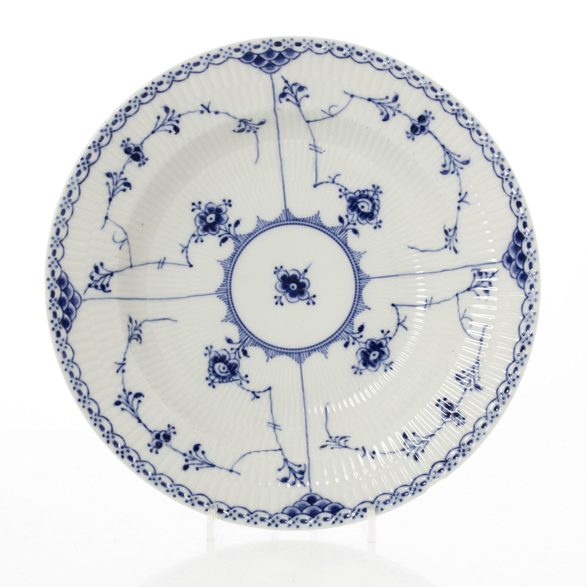 Royal Copenhagen, 35 pieces of a porcelain 'Blue Fluted' half lace dinner service, Denmark, 1889-1978.