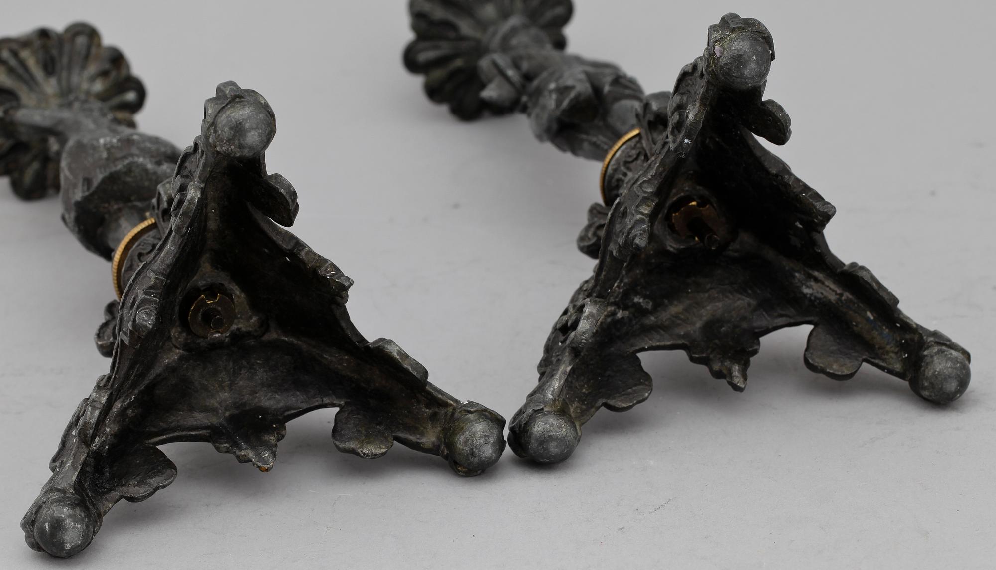 LJUSSTAKAR, ett par, gjutjärn, barockstil,  1800/1900-tal.