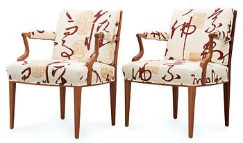 A pair of Josef Frank cherry and rattan armchairs, Svenskt Tenn, model 969.