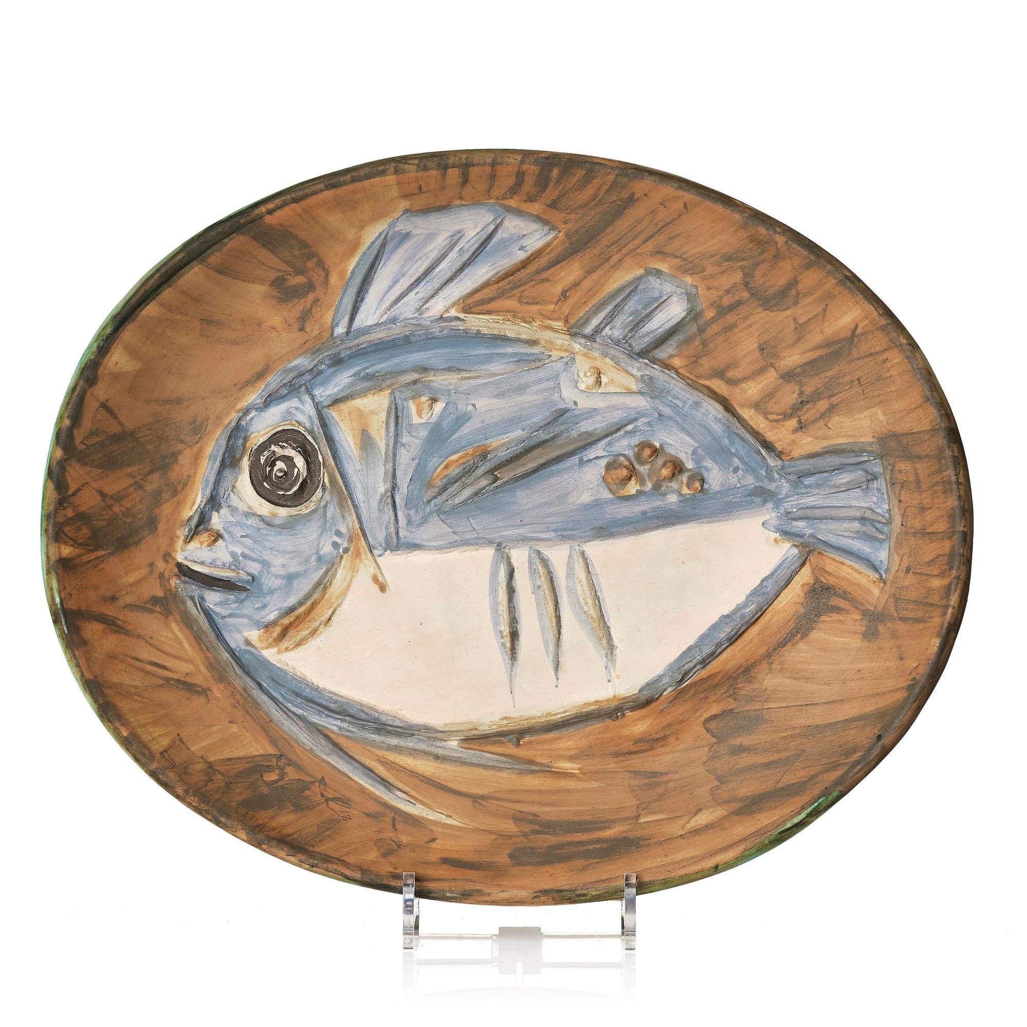 Pablo Picasso, a "Poisson" (see A.R. 166-171) faience dish, Madoura, Vallauris, France, post 1952.