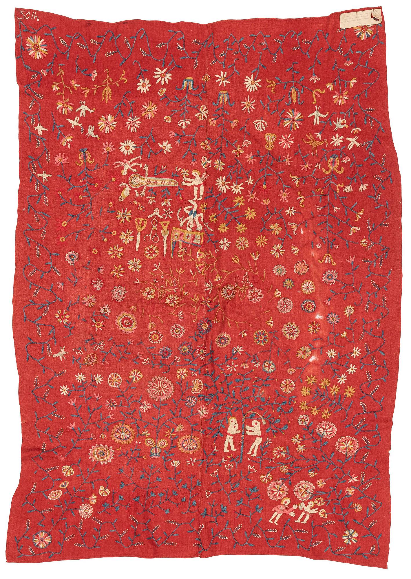 An embroided wool bed cover of 'fall of man' design, South west Scania, Sweden, first half of the 19th century.