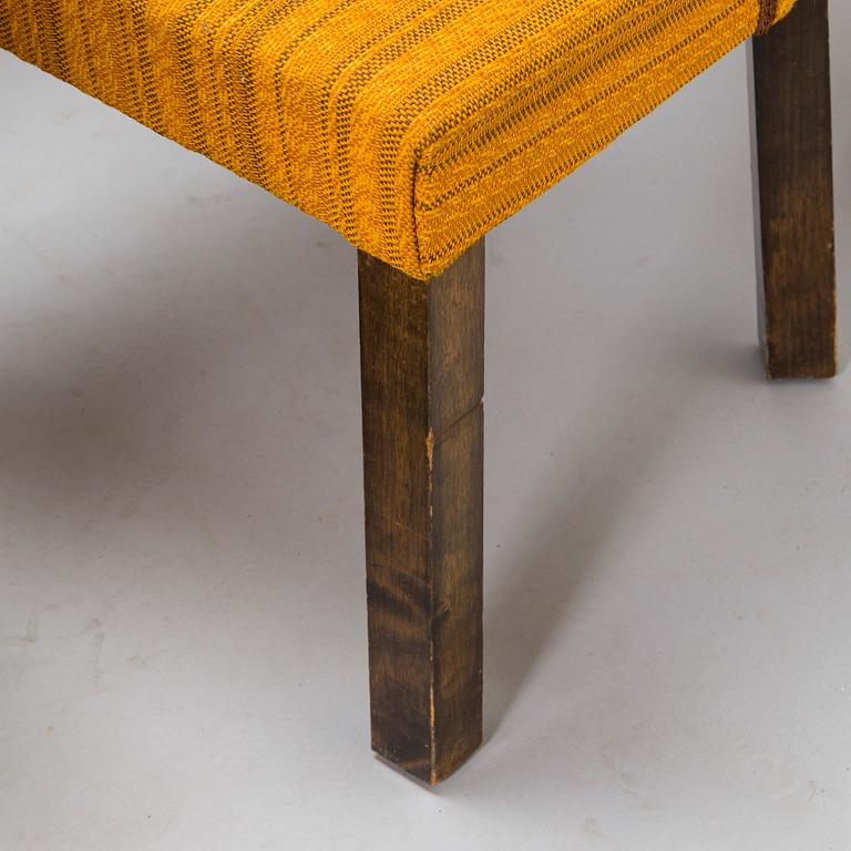 A Finnish 1930s dining table and eight chairs.