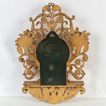 A late Empire wall clock by E. Engelbrechten.