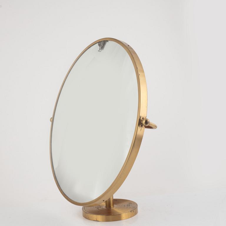 Josef Frank, a model 2214 table mirror, Firma Svenskt Tenn, mid 20th century.
