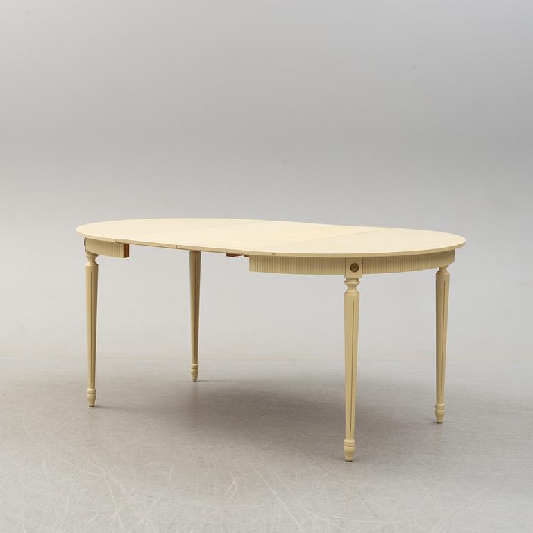 A set of six chairs and a dining table, gustavian style, late 20th century.