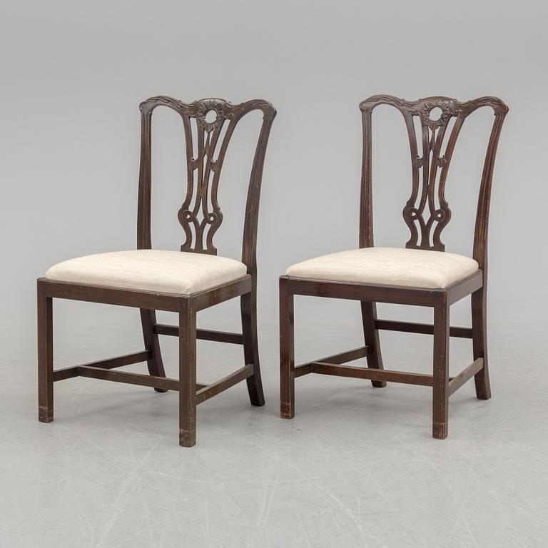 Twelve mid 20th century Chippendale model chairs.