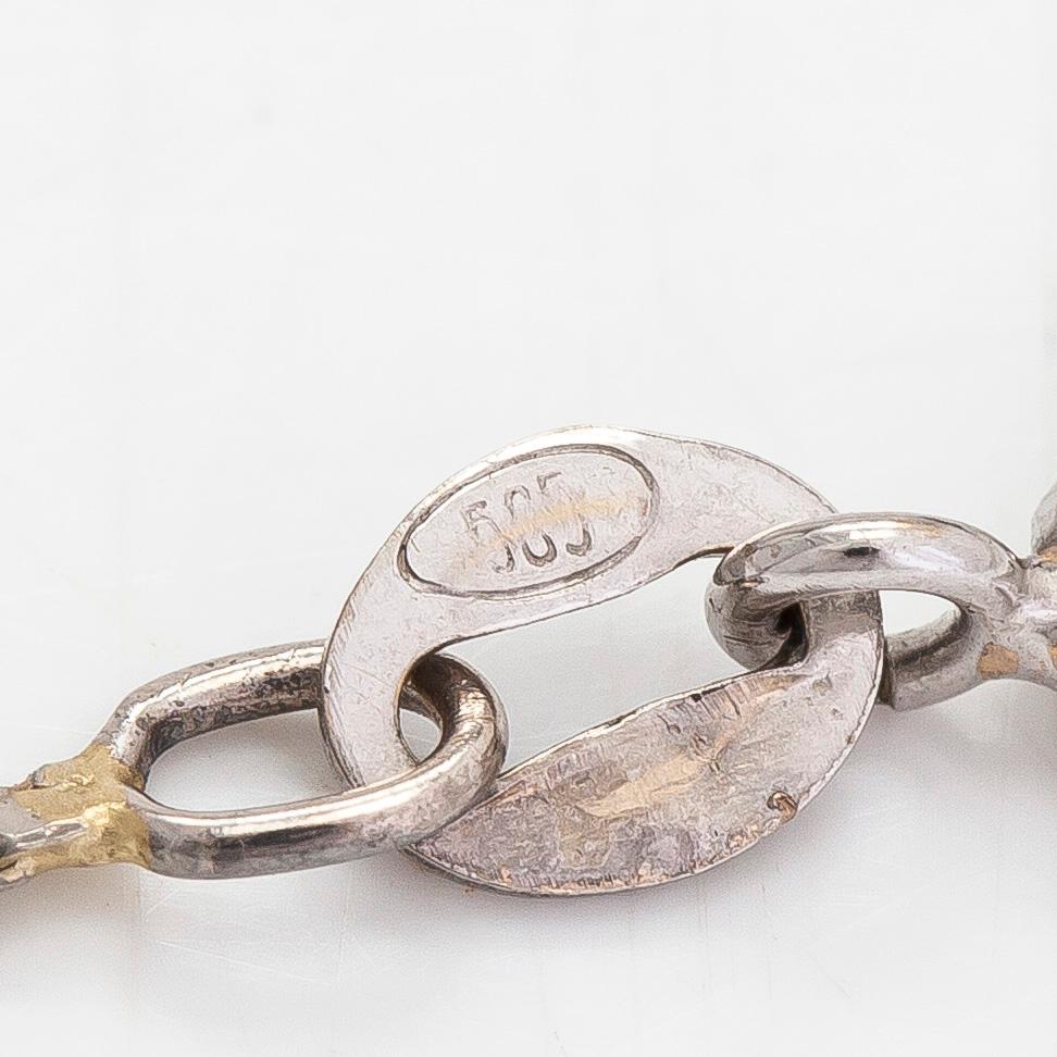 Kaulakoru, 14K valkokultaa, briljanttihiottuja timantteja yht. noin 1.37 ct. Suomalaiset tuontileimat 1988.