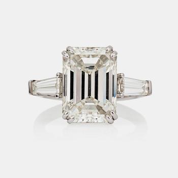 A 7.09 ct I/VS emerald-cut diamond ring. Certificates from HRD and GIA.