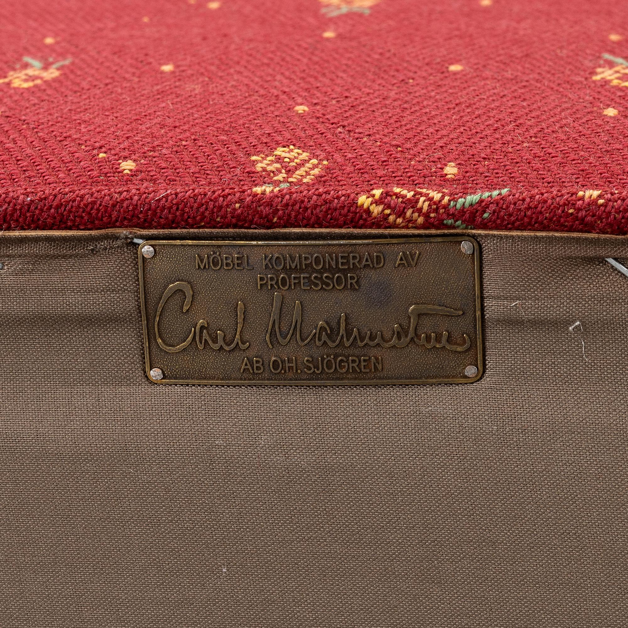 Carl Malmsten, a 'Häggbom' armchair with a 'Jättepaddan' ottoman, AB OH Sjögren, Tranås.