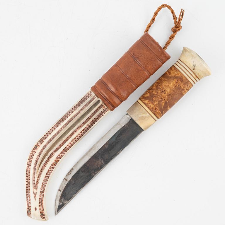 Esse Poggats, a reindeer horn knife, signed.