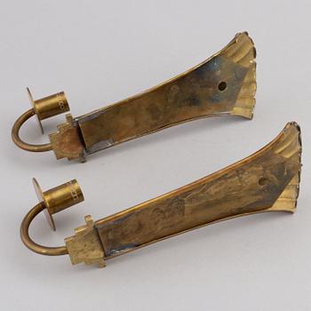 Lars Holmström, a pair of Swedish Grace brass wall sconces, Arvika, 1920's.