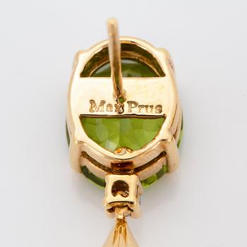 A pair of 18K gold earrings set with faceted peridots and with briolette-cut citrines.