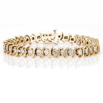 ARMBAND, med briljantslipade diamanter, totalt ca 3,50ct. 14K guld.