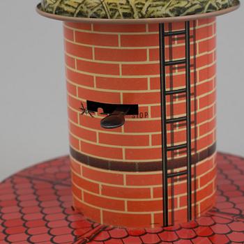 a German tin toy from the middle of the 20th century.