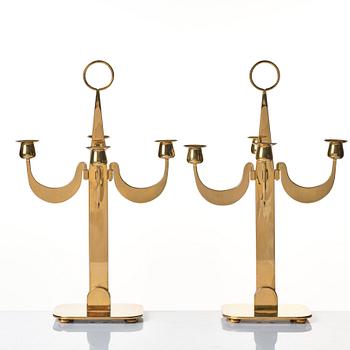 Josef Frank, a pair of brass candelabra by Svenskt Tenn, Sweden 1950's, model nr 2663.