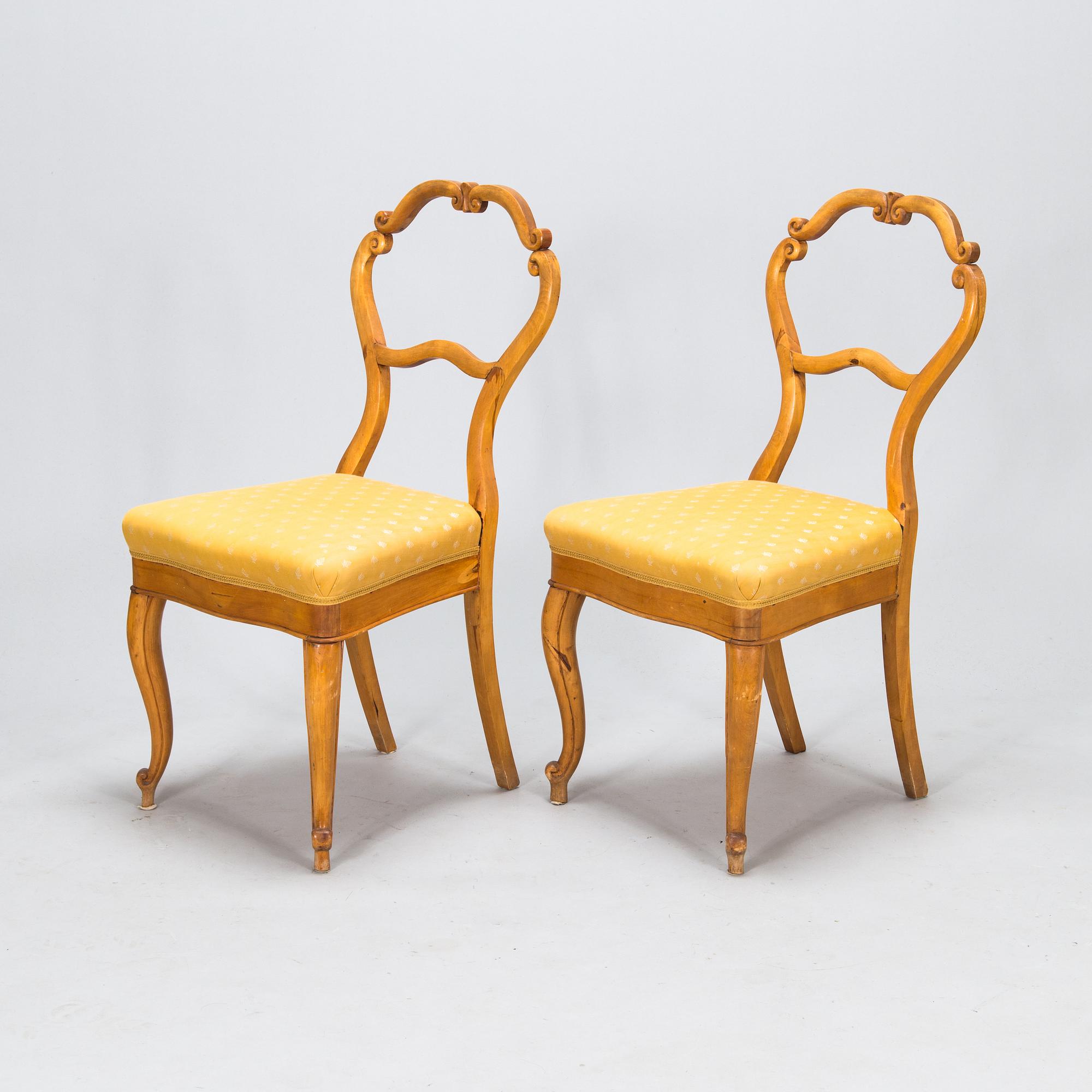 A pair of rococo revival chairs. Latter part of 19th century.