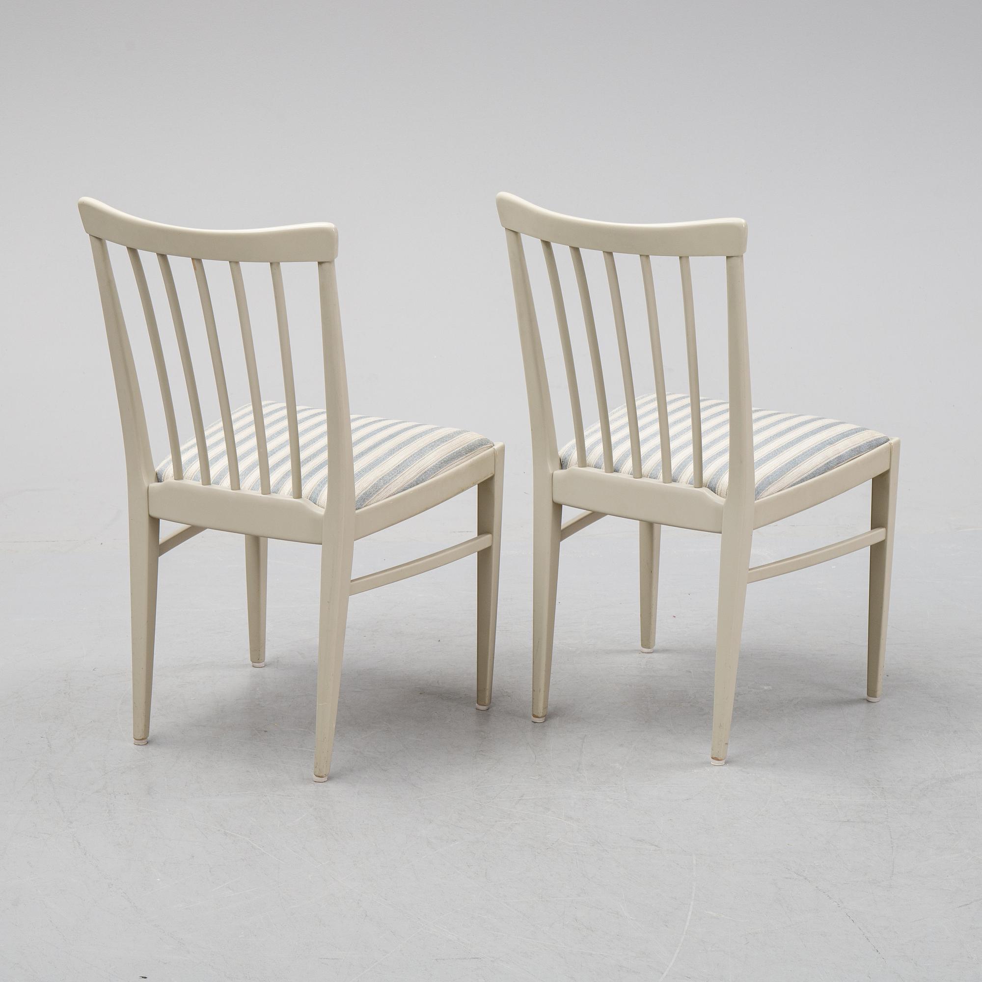 A dining table and six chairs by Carl Malmsten for Bodafors.