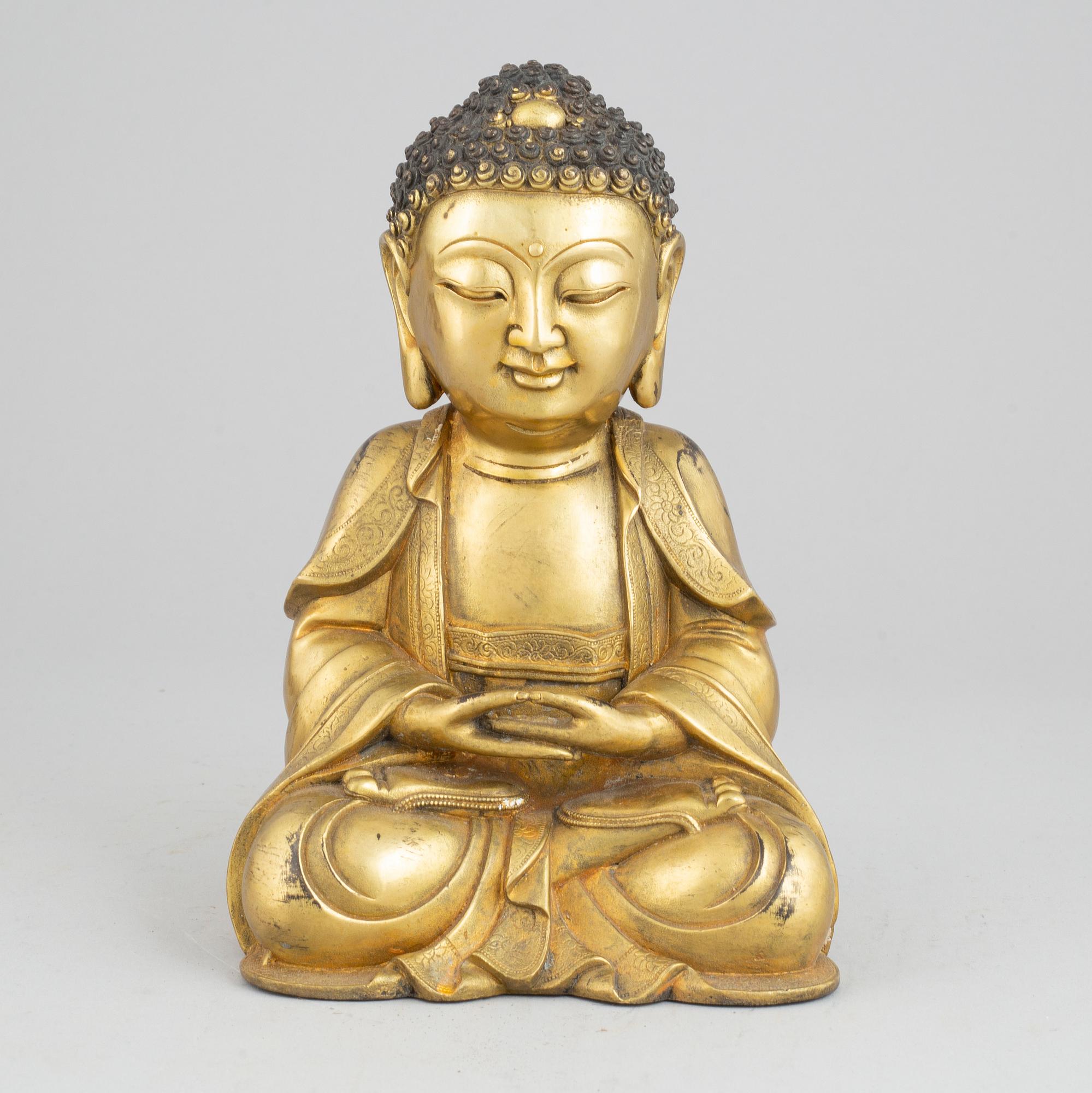 A bronze buddha, Ming style, 20th century.