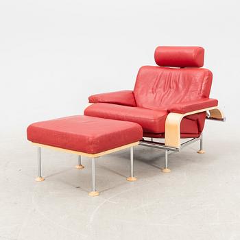 A Folke Fribyter leather armchair and fotstool 'Leo' from Nelo Knislinge around year 2000.