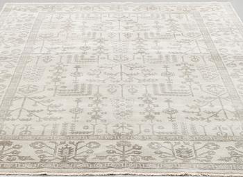 An oriental carpet, ca 364 x 273 cm.
