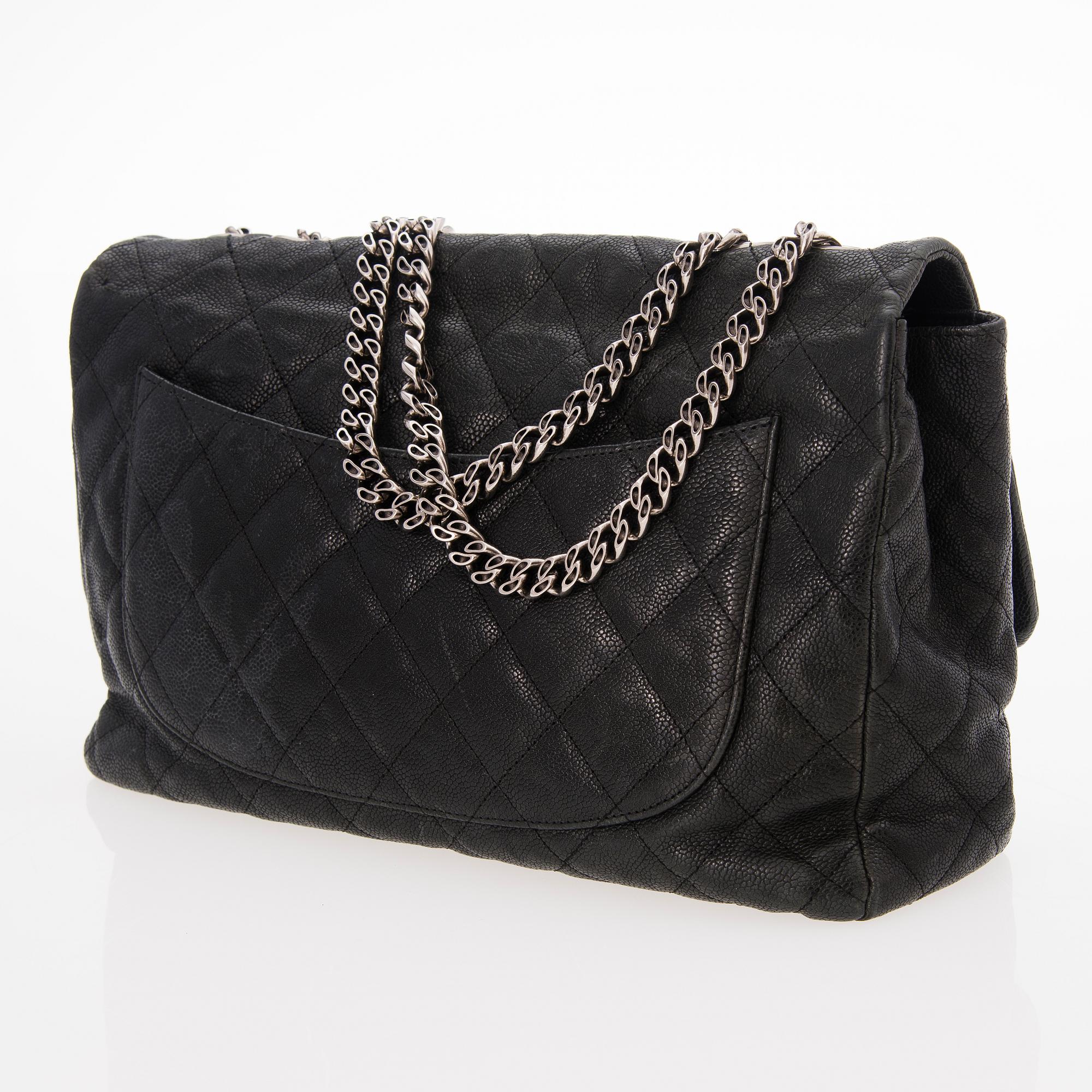 CHANEL Caviar Reissue 2.55 Jumbo Single Flap Bag.