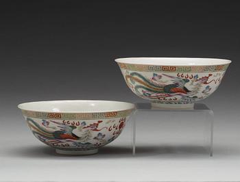 A pair of dragon and phoenix bowls, China, Republic with Qianlong mark.