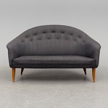 a 'Paradiset' sofa by KERSTIN HÖRLIN-HOLMQUIST for NK in the middle of the 20th century.