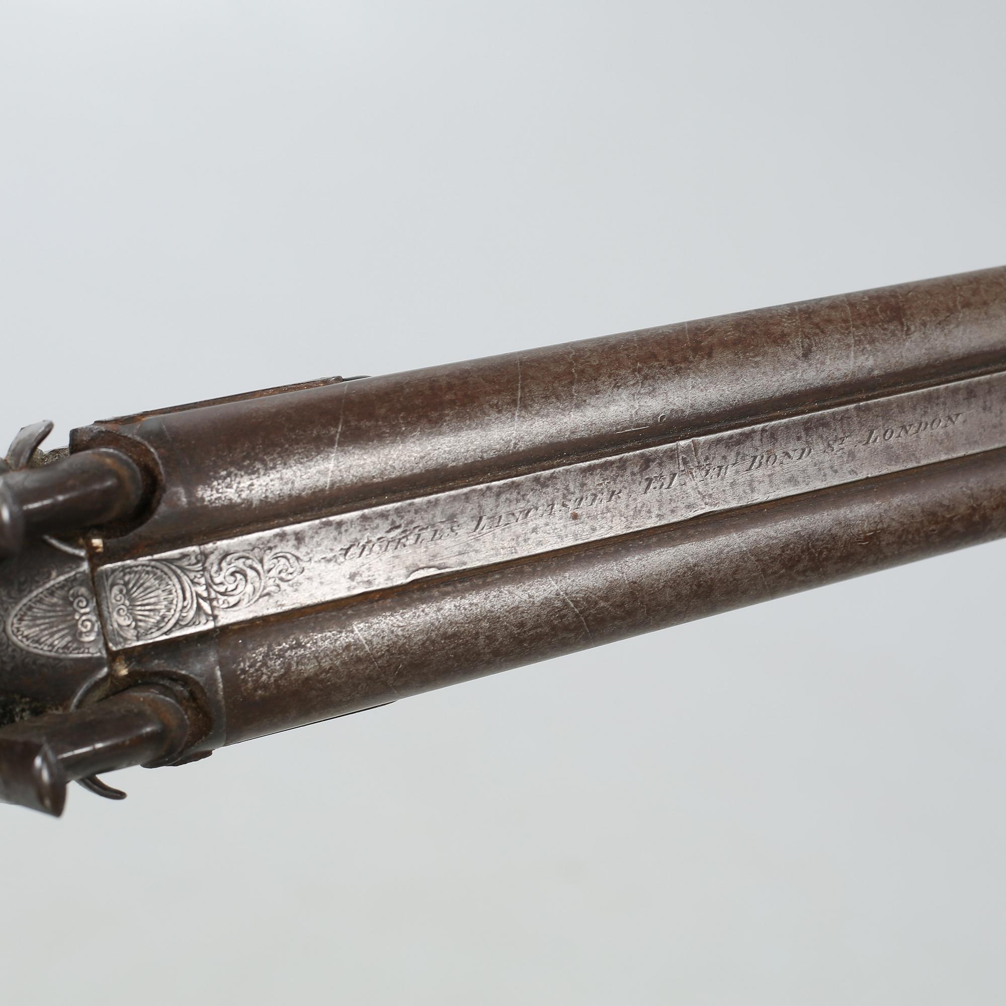 A percussion rifle by Charles William Lanchester in London, around the mid 19th century.