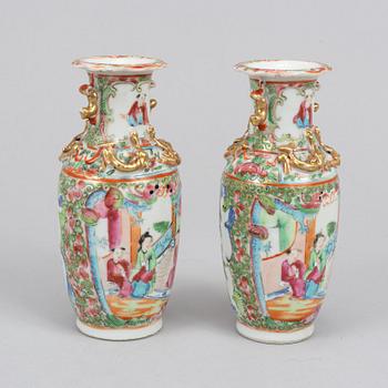 A pair of famille rose Canton table lamps and a pair of vases, late Qing dynasty, 19th Century.