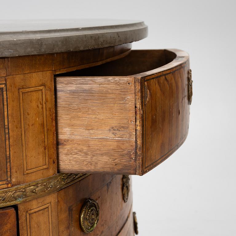A Louis XVI style chest of drawers, 19th century.