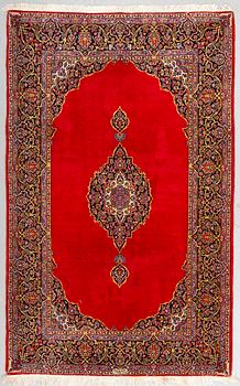A RUG, a Kashan, ca 227 x 142 cm, signed Kashan - Shadi/Keshan Shadsar.