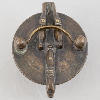 A set of three Nuremberg brass nested cup weights, one by Christoph or Johan Conrad Schön (masters 1746(1750).