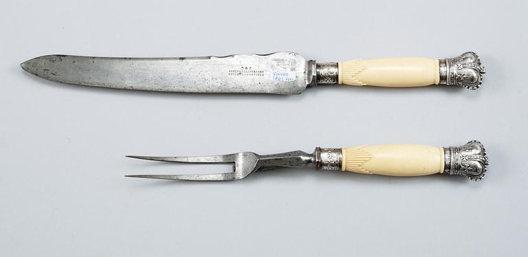A carving knife and fork, Sheffield 1857-61.