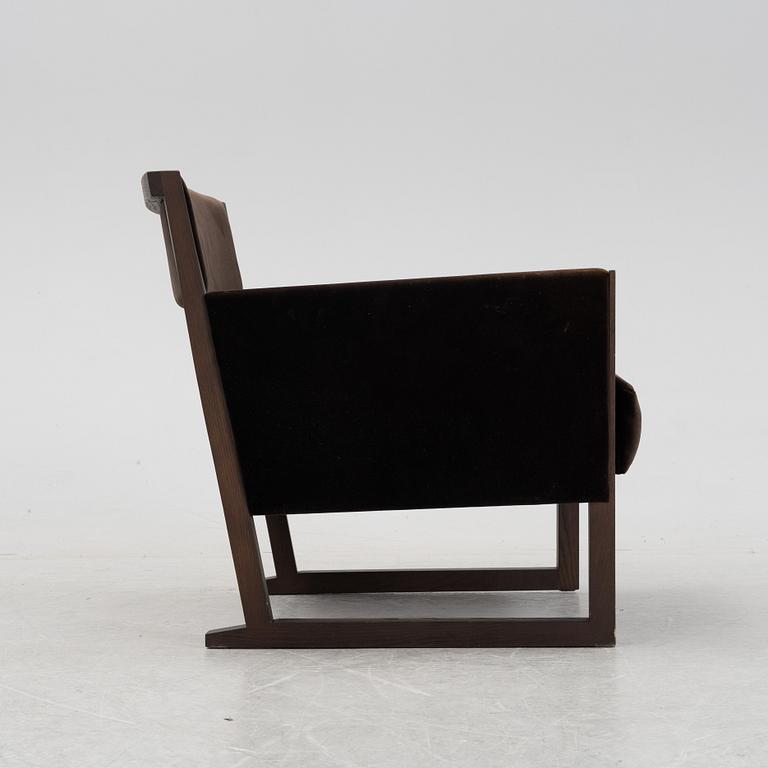 A 'Musa' easy chair by Antonio Citterio for Maxalto, designed 2006.