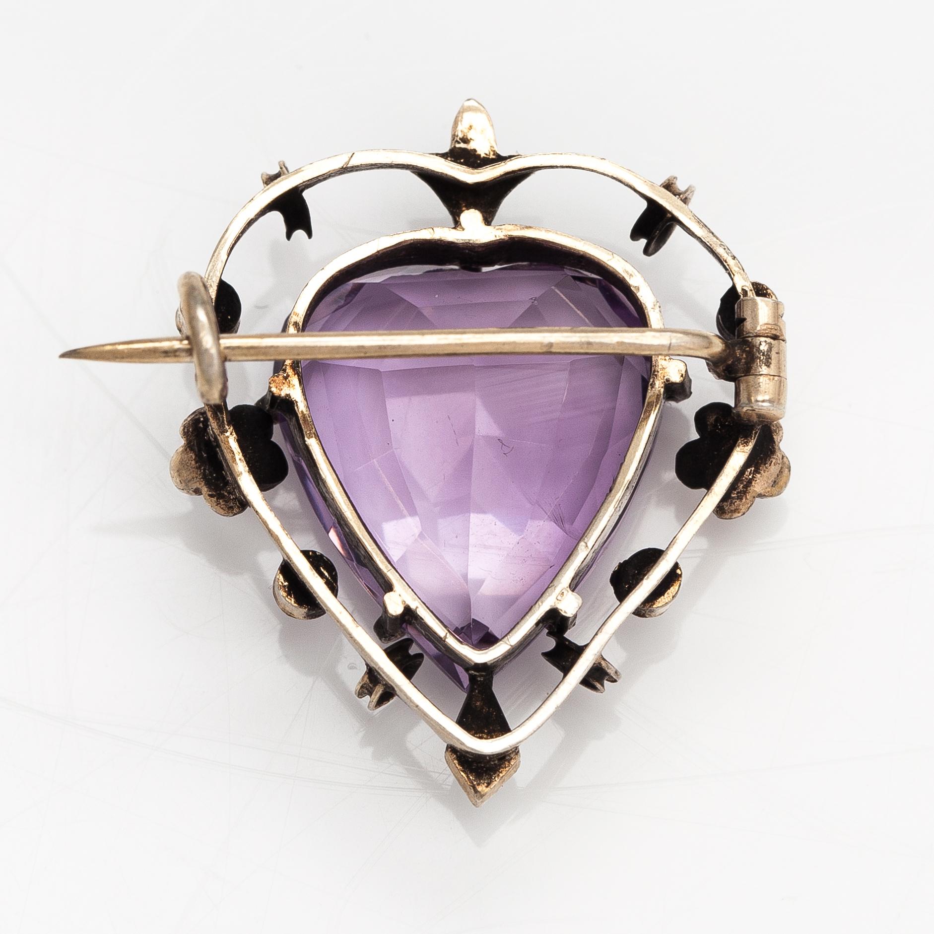 A necklace, bracelet and two brooches in gilded silver and with amethysts and pearls.