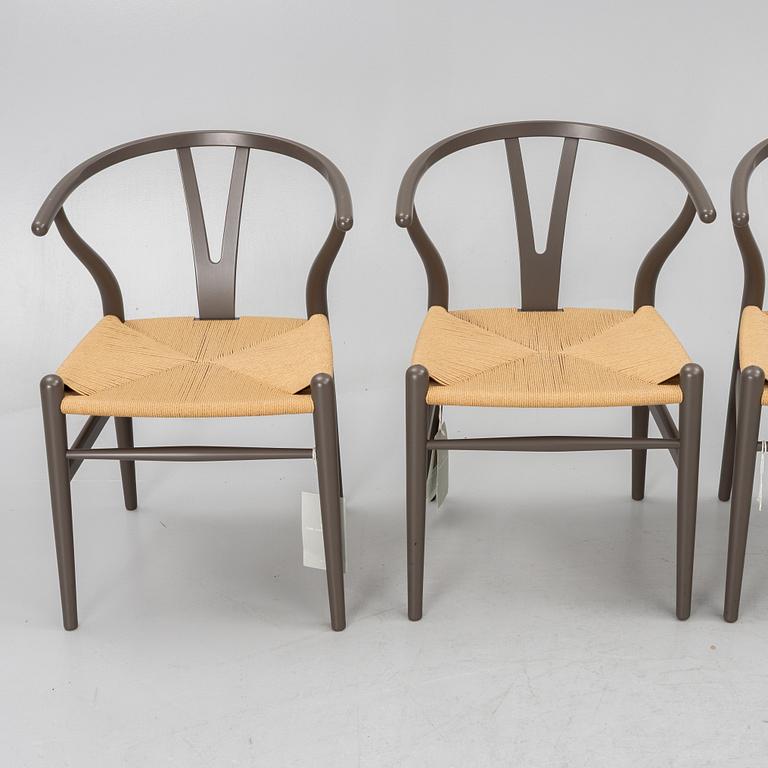 Hans J. Wegner, four CH 24 chairs, Carl Hansen & Son, Denmark.