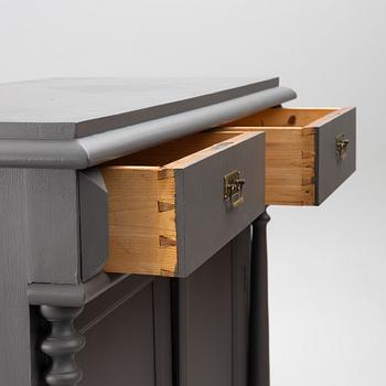 A sideboard, circa 1900.