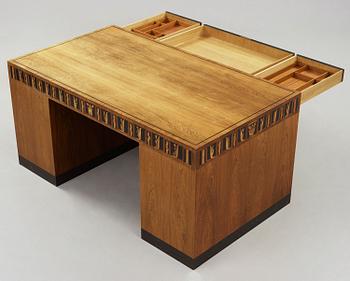 A Carl Malmsten palisander desk, Åtvidaberg, Sweden circa 1934.