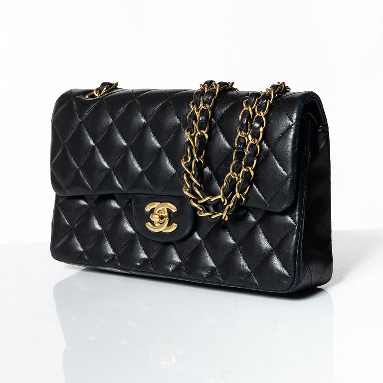 Chanel, A black leather 'Double Flap Bag Small'.
