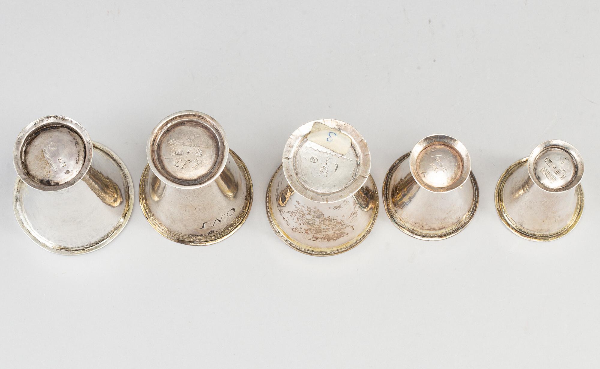 Five Swedish 18th century parcel-gilt silver beakers.