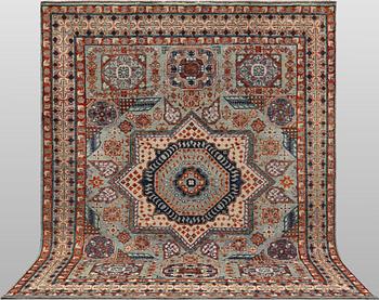 An Oriental carpet, c. 296 x 249 cm.
