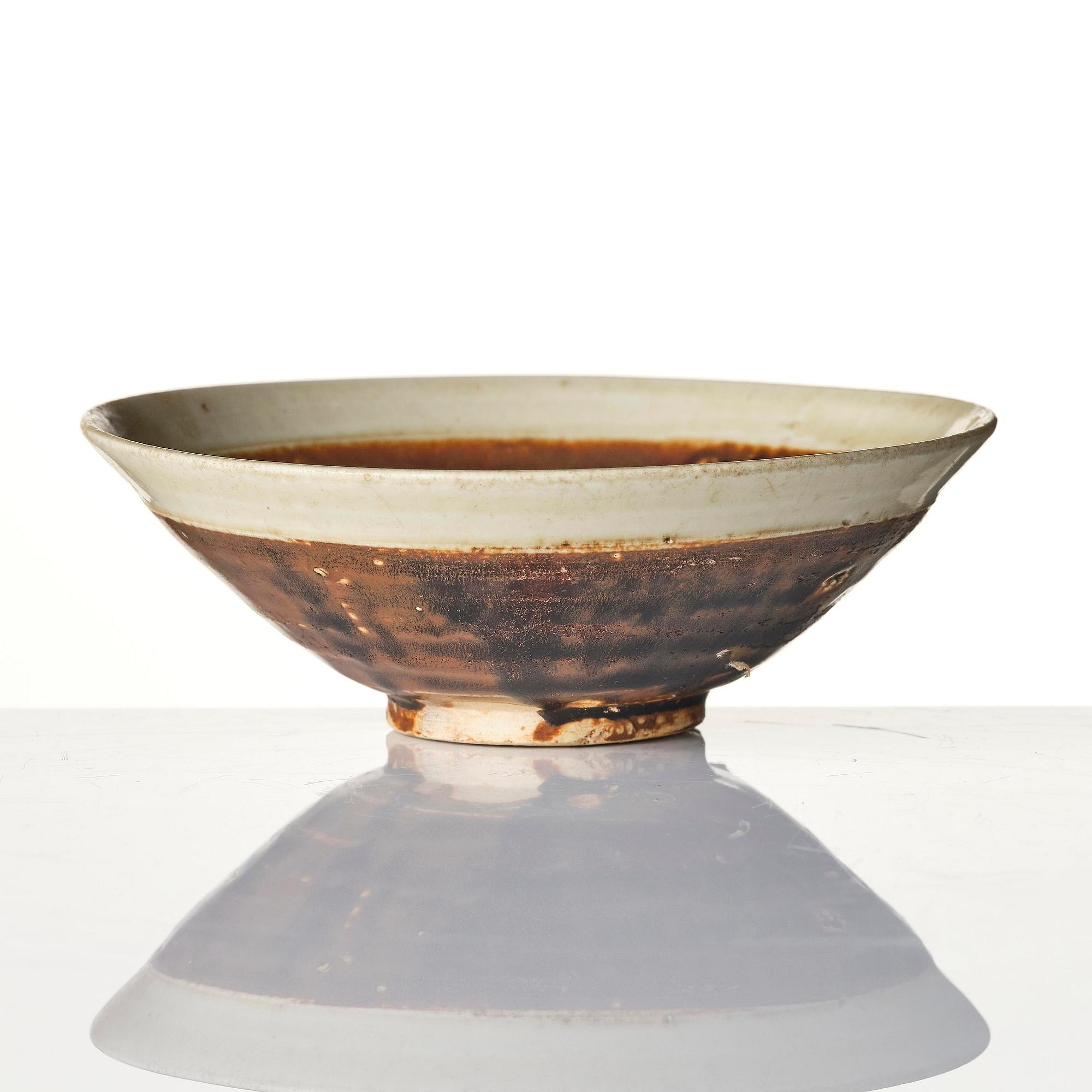 A brown and white glazed bowl, Song dynasty (960-1279).
