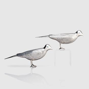 332. A pair of persian silver pigeons, the Qajar dynasty (1789–1925).